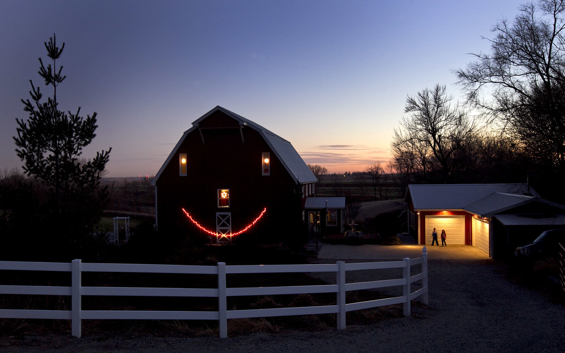 This home at 23561 Barrus Road in Mills County, Iowa, was built out of a barn and cheers passing motorists with its Christmas lights.